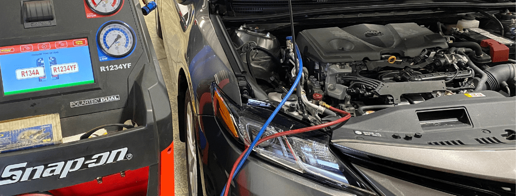 1234yf A/C. Auto a/c repair in Franklin, MA by Advanced European Repair. Image of a vehicle undergoing A/C service with a Snap-on refrigerant recovery machine, demonstrating the shop’s commitment to precise climate control diagnostics and reliable performance for European vehicles.