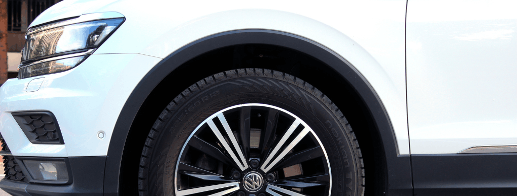 VW suspension repair, European auto repair in Franklin, MA. Image of Volkswagen wheel and tire highlighting professional tire inspections, wheel balancing, and tire replacement services for safe handling and reliable driving performance.
